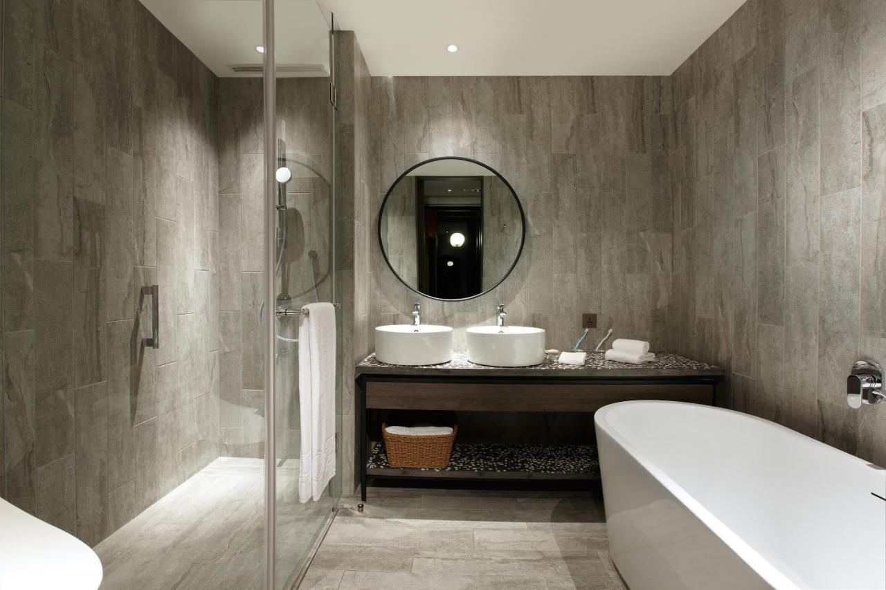 Cozzi Blu Hotel Csungli Kültér fotó Bathroom