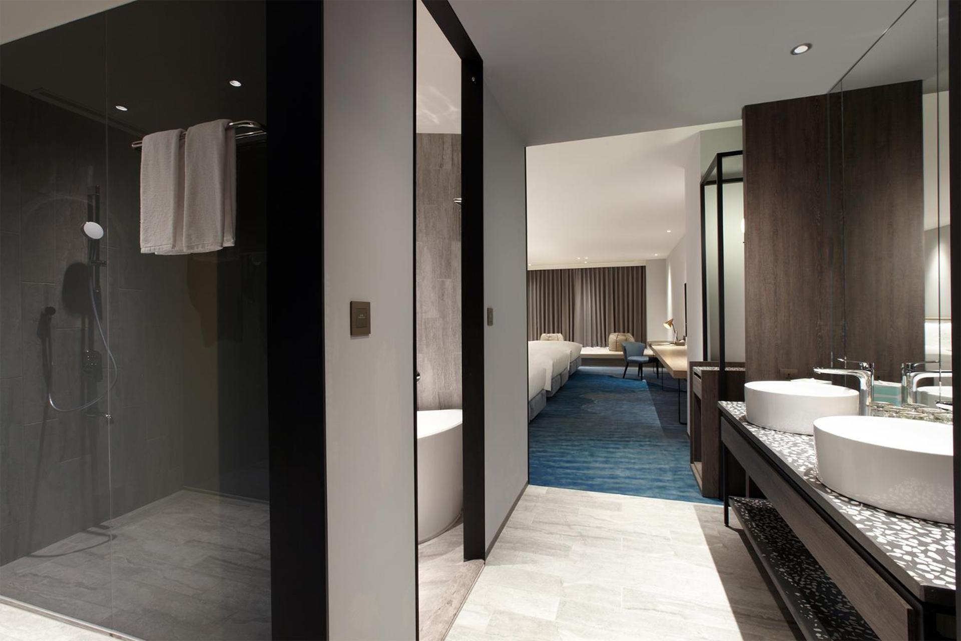 Cozzi Blu Hotel Csungli Kültér fotó A bathroom at the hotel